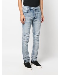 hellblaue Jeans mit Destroyed-Effekten von Ksubi