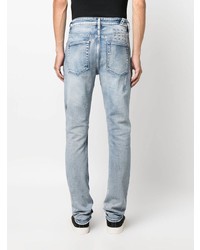 hellblaue Jeans mit Destroyed-Effekten von Ksubi