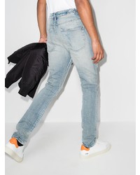 hellblaue Jeans mit Destroyed-Effekten von Ksubi