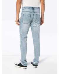 hellblaue Jeans mit Destroyed-Effekten von Ksubi