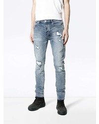 hellblaue Jeans mit Destroyed-Effekten von Ksubi