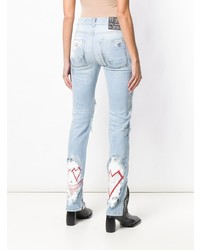 hellblaue Jeans mit Destroyed-Effekten von Mjb