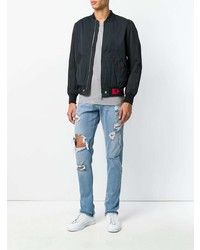 hellblaue Jeans mit Destroyed-Effekten von Diesel