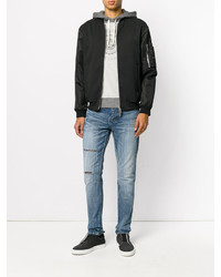 hellblaue Jeans mit Destroyed-Effekten von Saint Laurent