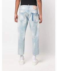 hellblaue Jeans mit Destroyed-Effekten von Philipp Plein