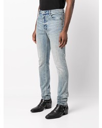 hellblaue Jeans mit Destroyed-Effekten von Ksubi