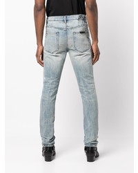 hellblaue Jeans mit Destroyed-Effekten von Ksubi