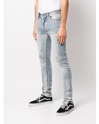hellblaue Jeans mit Destroyed-Effekten von Ksubi