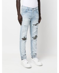 hellblaue Jeans mit Destroyed-Effekten von Amiri