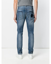 hellblaue Jeans mit Destroyed-Effekten von Philipp Plein