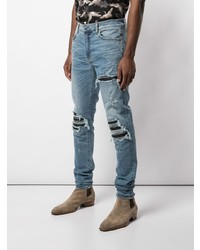 hellblaue Jeans mit Destroyed-Effekten von Amiri