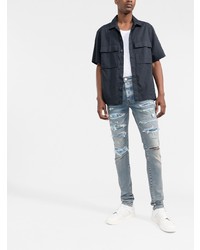 hellblaue Jeans mit Destroyed-Effekten von Amiri