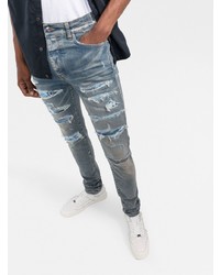 hellblaue Jeans mit Destroyed-Effekten von Amiri