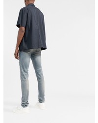 hellblaue Jeans mit Destroyed-Effekten von Amiri