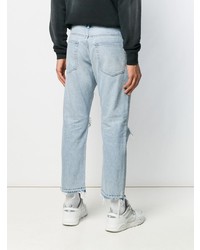 hellblaue Jeans mit Destroyed-Effekten von John Elliott