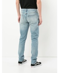 hellblaue Jeans mit Destroyed-Effekten von Agolde