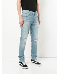 hellblaue Jeans mit Destroyed-Effekten von Agolde