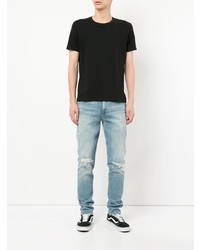 hellblaue Jeans mit Destroyed-Effekten von Agolde