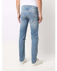 hellblaue Jeans mit Destroyed-Effekten von VERSACE JEANS COUTURE