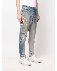 hellblaue Jeans mit Destroyed-Effekten von Greg Lauren