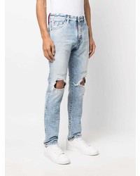 hellblaue Jeans mit Destroyed-Effekten von DSQUARED2