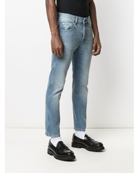 hellblaue Jeans mit Destroyed-Effekten von Gucci