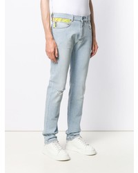 hellblaue Jeans mit Destroyed-Effekten von Versace