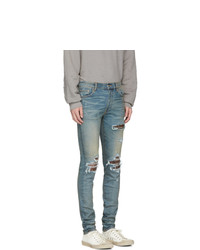 hellblaue Jeans mit Destroyed-Effekten von Amiri