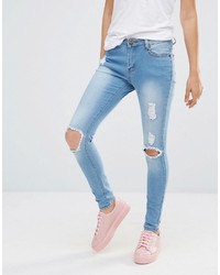 hellblaue Jeans mit Destroyed-Effekten