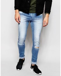 hellblaue Jeans mit Destroyed-Effekten