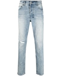 hellblaue Jeans mit Destroyed-Effekten von Ksubi