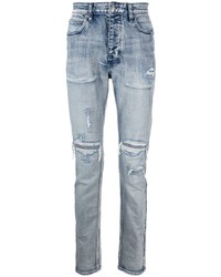 hellblaue Jeans mit Destroyed-Effekten von Ksubi