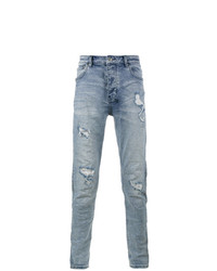 hellblaue Jeans mit Destroyed-Effekten von Ksubi