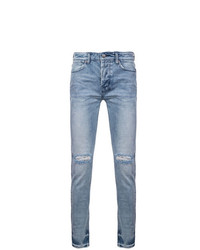 hellblaue Jeans mit Destroyed-Effekten von Ksubi