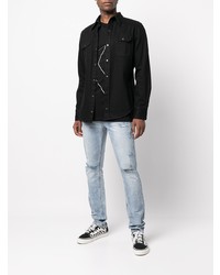 hellblaue Jeans mit Destroyed-Effekten von Ksubi