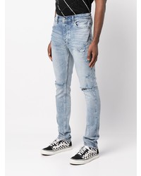 hellblaue Jeans mit Destroyed-Effekten von Ksubi