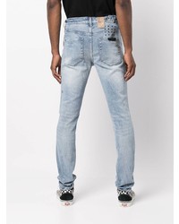 hellblaue Jeans mit Destroyed-Effekten von Ksubi