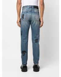 hellblaue Jeans mit Destroyed-Effekten von Palm Angels