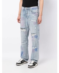 hellblaue Jeans mit Destroyed-Effekten von Ksubi