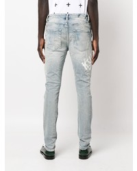 hellblaue Jeans mit Destroyed-Effekten von Ksubi