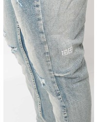 hellblaue Jeans mit Destroyed-Effekten von Ksubi