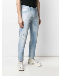 hellblaue Jeans mit Destroyed-Effekten von Dondup