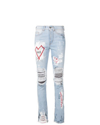 hellblaue Jeans mit Destroyed-Effekten von Mjb