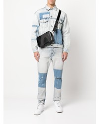 hellblaue Jeans mit Destroyed-Effekten von Ksubi