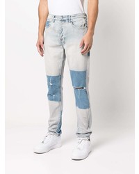 hellblaue Jeans mit Destroyed-Effekten von Ksubi