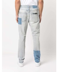 hellblaue Jeans mit Destroyed-Effekten von Ksubi