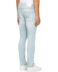 hellblaue Jeans mit Destroyed-Effekten von Balmain