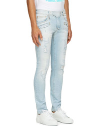 hellblaue Jeans mit Destroyed-Effekten von Balmain