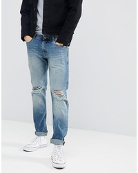 hellblaue Jeans mit Destroyed-Effekten von Produkt