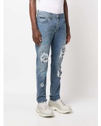 hellblaue Jeans mit Destroyed-Effekten von Philipp Plein